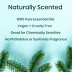 A promotional graphic with the text 'Naturally Scented' and several benefit statements about pure essential oils, vegan cruelty-free status, suitability for chemically sensitive individuals, and no phthalates or synthetic fragrance. The background is a soft light aqua gradient with green pine branches along the bottom edge.